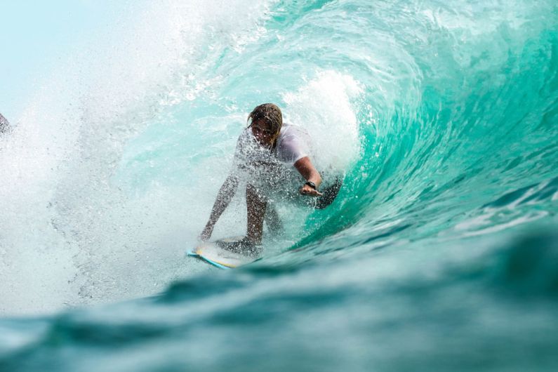 Surfing - time lapse photography surfer in wave water