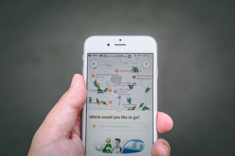 Ride-Sharing - person holding silver iPhone 6