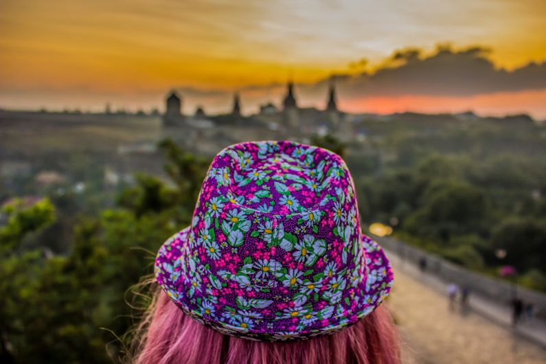 One-Day Trips - a person with a flower in the hair