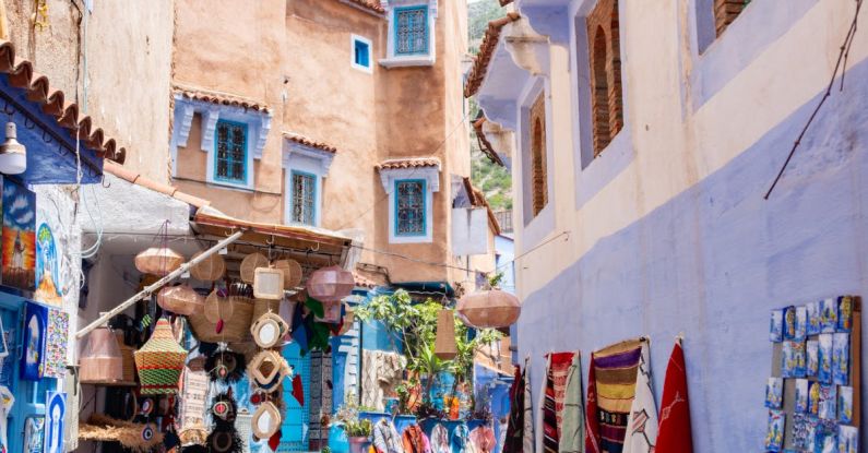 Chichicastenango Market - A narrow alley with blue and white buildings