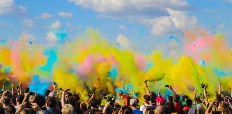 Rabin Ajau Festival - group of people celebrating powder festival outdoors